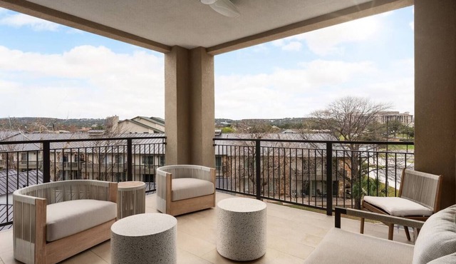 Luxury King Suite | Large Balcony | Pool + Hot Tub