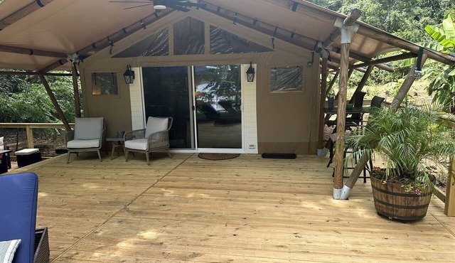 Modern Fully Equipped Safari Tent with Spacious Deck in North Carolina