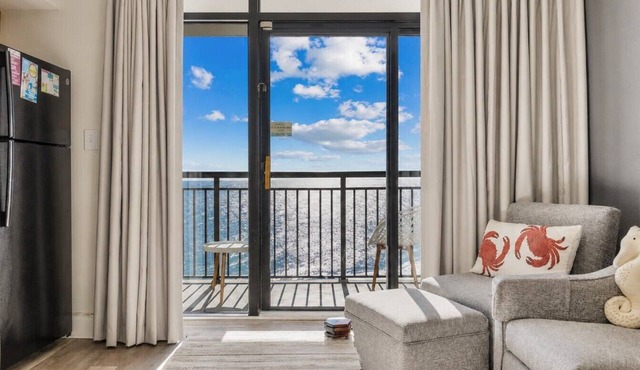 Oceanfront Condo Balcony with Resort Pool Hot Tub