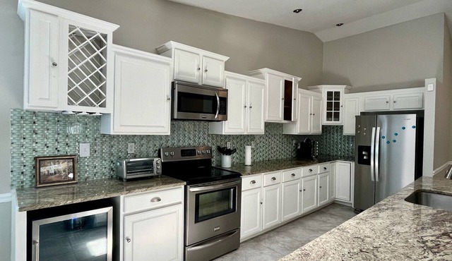 Pet-friendly 3-bed 2-bath house with pool, WiFi & open floor plan in Seffner