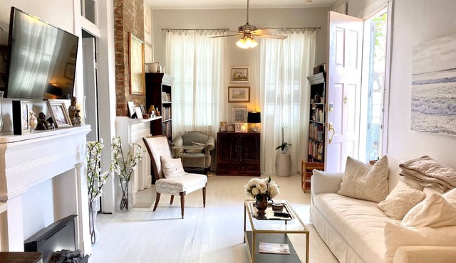 Pristine 1880s Uptown Victorian Shotgun Cottage with Weekly Housekeeper