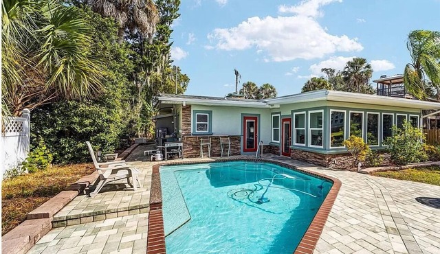 Spacious Waterfront Getaway with Heated Pool