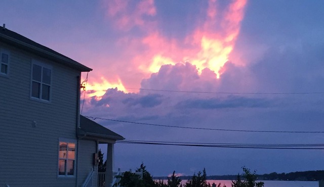 Spectacular sunsets and water views, only steps to beach and boardwalk!