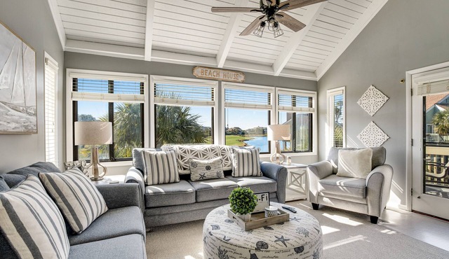 Stylish beach villa with three decks, and golf course views