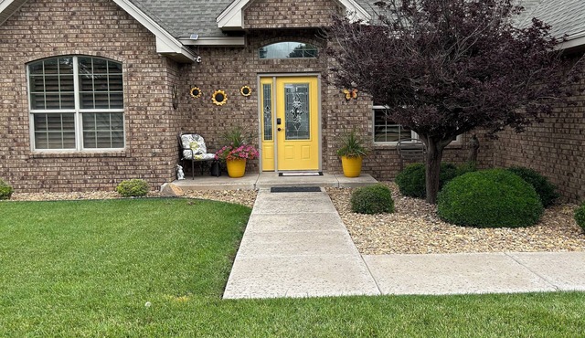 Sunshine Retreat with a game room, 4 bedrooms, and pet friendly.