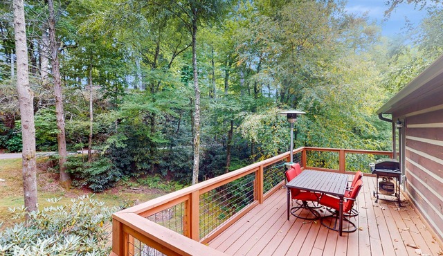 Tree-lined, dog-friendly cabin in ideal location with deck, wood stove & pool