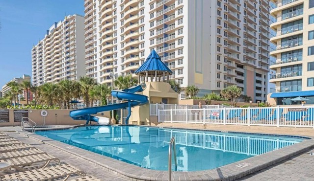 Two Bedroom Unit w/Balcony | Full Kitchen | Outdoor Pool Access | Free Parking