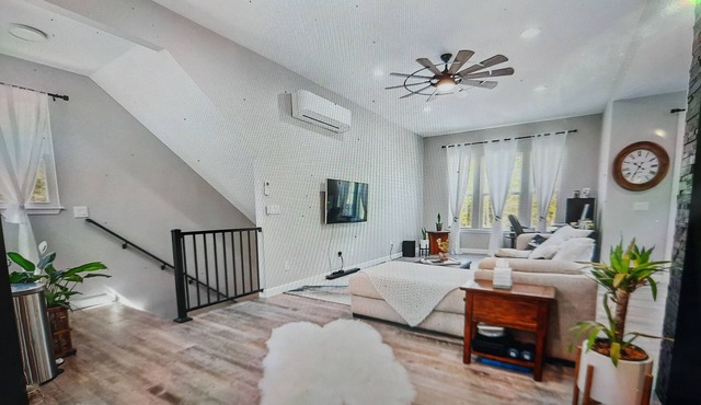 Unique Loft with upstairs open floor plan with 4 car garage