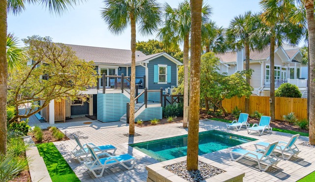Updated 3 bedroom home, walk to beach, private pool, screened porch!