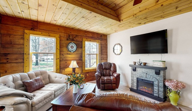Updated and peaceful home with open layout, fireplace, streaming, deck, AC