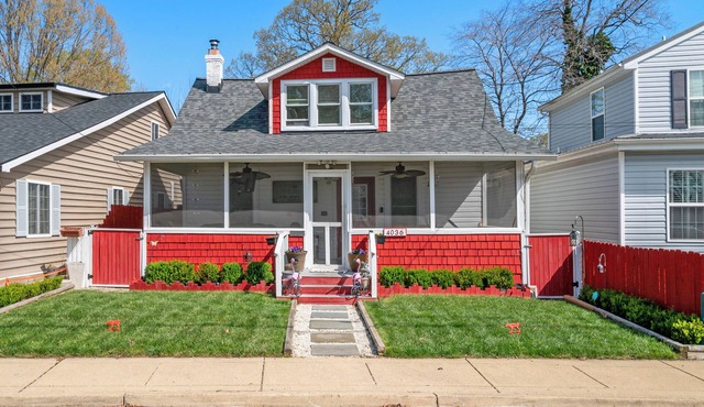 Walk to the Boardwalk from This Bay Beach House with Porch TV and Firepit